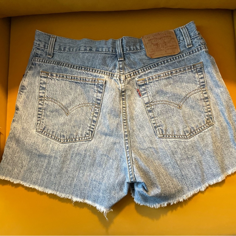 Levi’s 555 Women’s Denim frayed light wash shorts